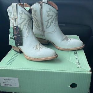 Have little scratches on top and around it and some yellowing on the side